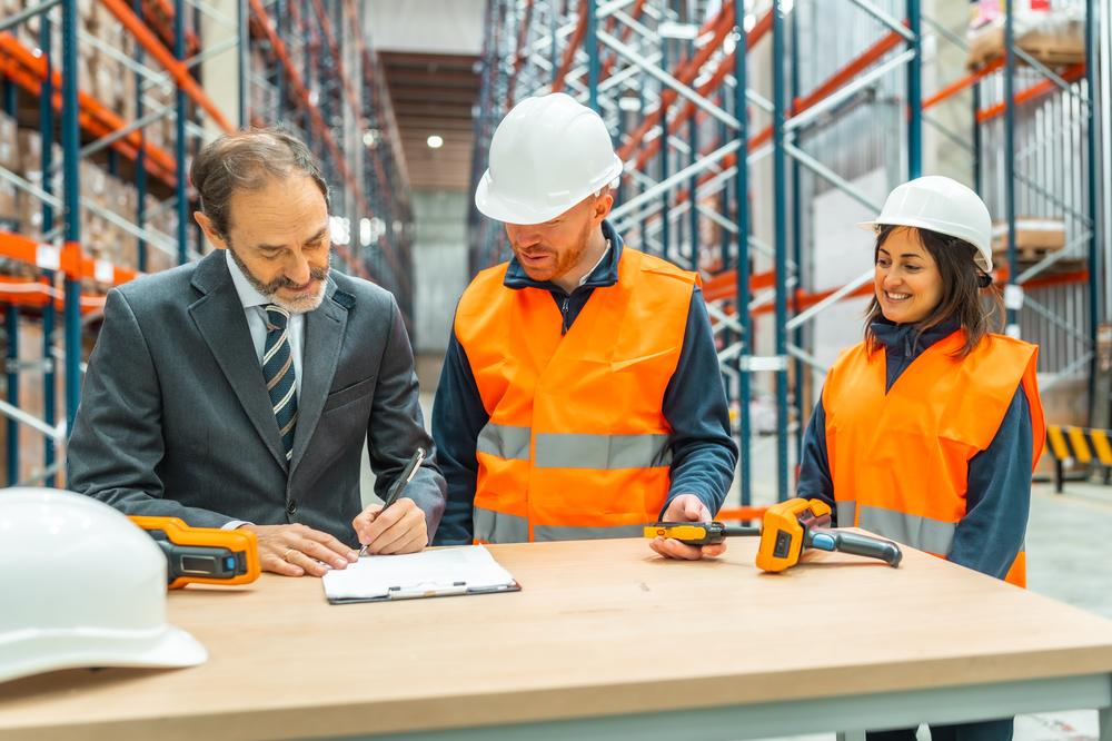 Warehouse manager signing off on a rush order